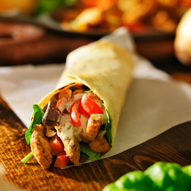 chicken with in tortilla with red peppers